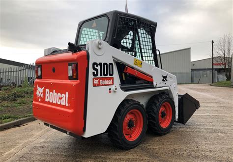 how much does an s 100 bobcat skid steer weigh|bobcat s100 lifting capacity.